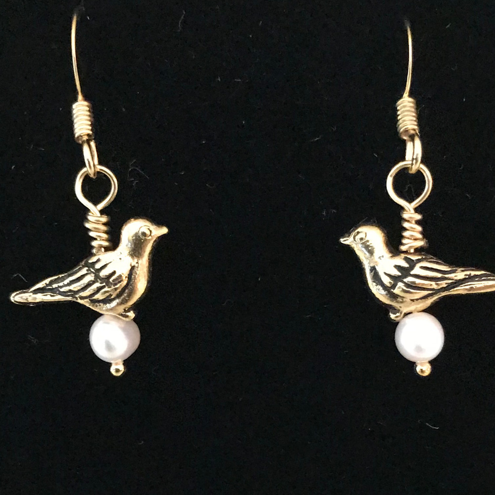 Gold tone bird earrings